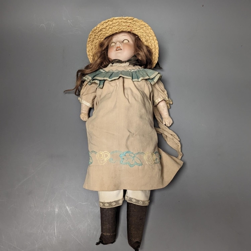 1382 - An Armand Marseille 370 bisque headed doll, wearing a basket weave boater and brown embroidered dres... 