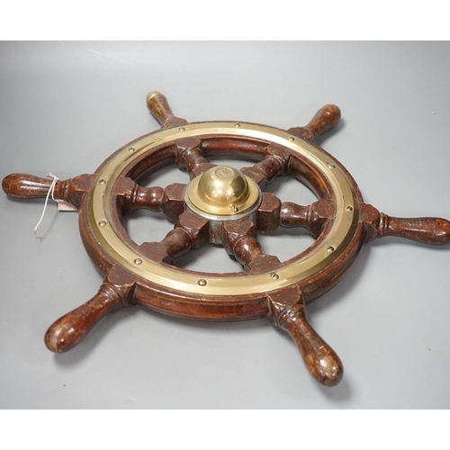 1385 - A hardwood and brass mounted Ship's wheel, signed Lawrence Simpson 50cm