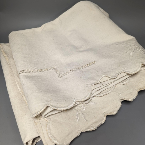 1392 - Four embroidered French provincial coarse linen sheets and three plain sheets.