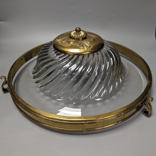 1403 - A circular brass and glass plathonier, first half 20th century42 cms diameter.