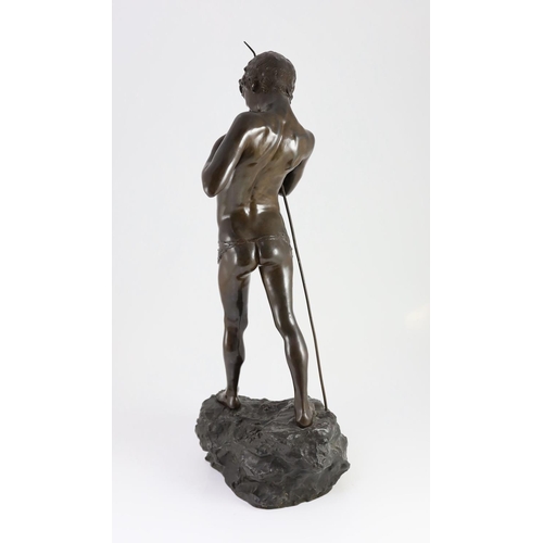 1408 - Giovanni Varlese (Italian, 1888-1922). A bronze figure of a fisherboy standing holding a fish to his... 