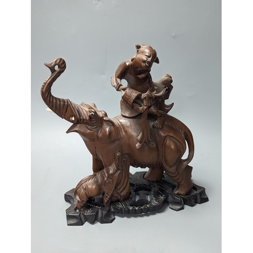 1410 - A pair of Chinese wood carvings figures on elephants, a pair of Chinese bear bookends,Chines figures... 