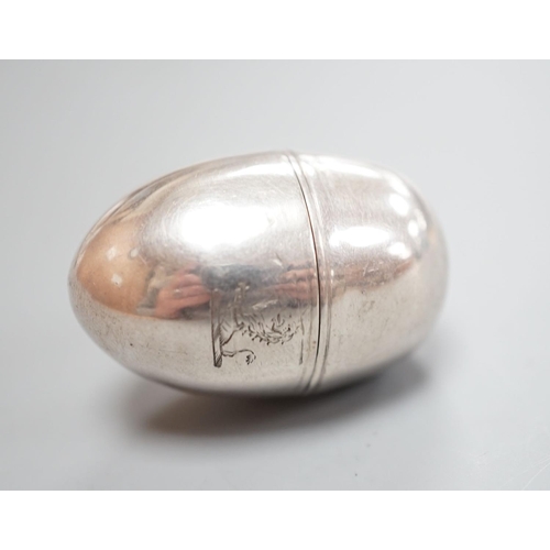 1801 - A George III silver egg shaped vinaigrette, by SM or WS, London, 1796, with engraved crest, 40mm.... 