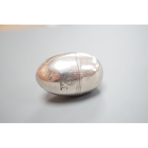 1801 - A George III silver egg shaped vinaigrette, by SM or WS, London, 1796, with engraved crest, 40mm.... 