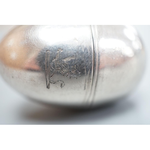 1801 - A George III silver egg shaped vinaigrette, by SM or WS, London, 1796, with engraved crest, 40mm.... 