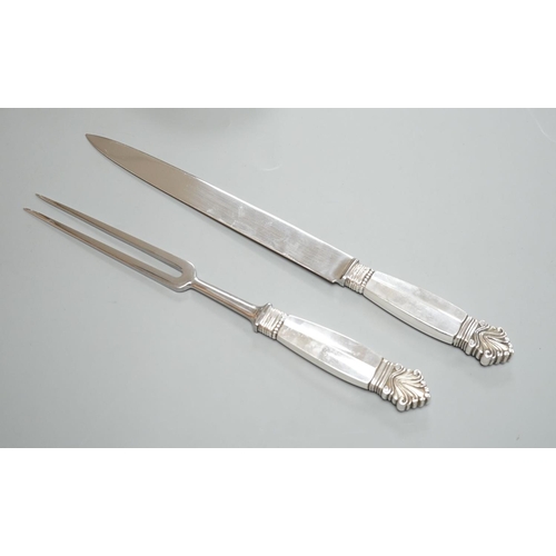 1806 - A pair of Georg Jensen sterling handled carving knife and fork, knife 34.4cm.