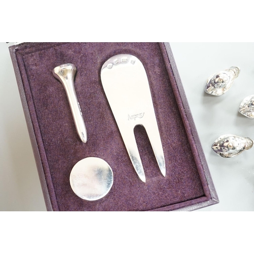 1807 - A modern Asprey cased silver golfer's companion set, comprising a tee, marker and pitch mark repaire... 