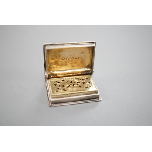 1818 - An early Victorian novelty silver vinaigrette, modelled as a book, Taylor & Perry, Birmingham, 1838,... 