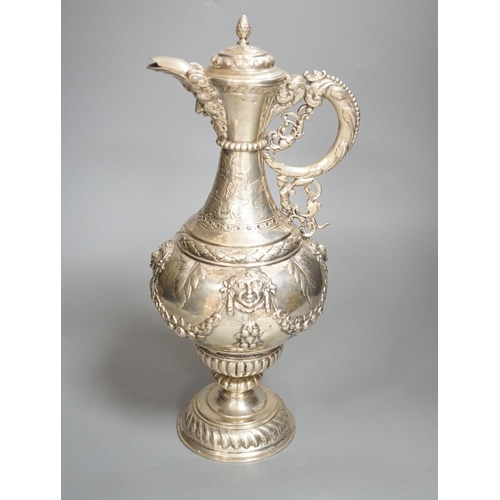 1819 - A 19th century Continental white metal wine ewer, embossed with swags and masks, height 29.9cm, 16.5... 