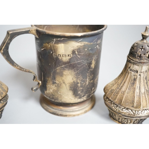 1823 - A 1930's silver christening mug, 85mm and three other items including a 9ct and white metal ring sha... 