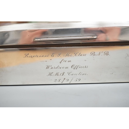 1825 - A late 1950's engine turned silver mounted rectangular cigarette box, with engraved inscription, 17.... 