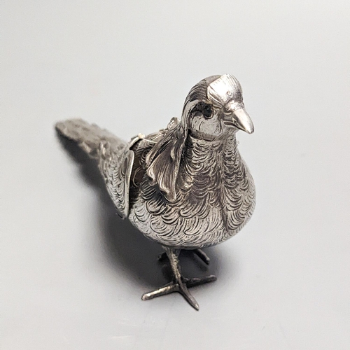 1832 - A late 19th century Hanau 800 white metal novelty condiment?, modelled as a game bird, with articula... 