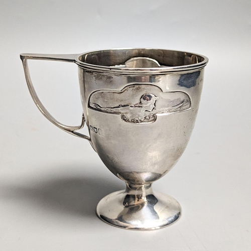 1833 - An Edwardian Art Nouveau silver pedestal christening mug, by William Hutton & Sons, London, 1904, 97... 