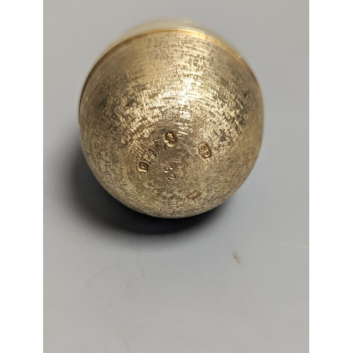 1834 - A 1970's textured silver gilt surprise egg by Stuart Devlin, opening to reveal a ship's anchor with ... 