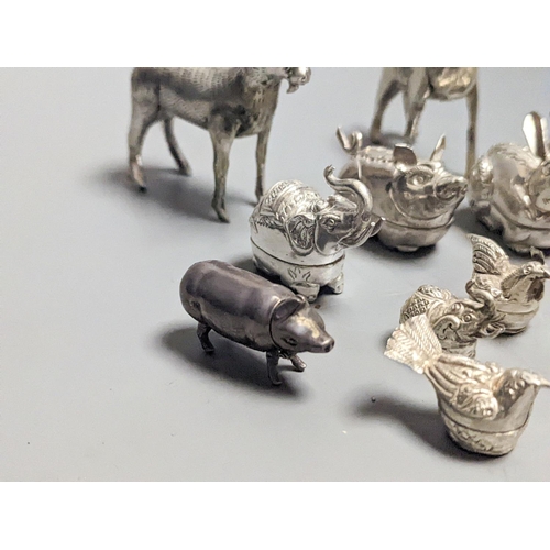 1839 - A modern 925 mounted pig pin cushion, 24mm, a similar pig vesta case, four small 925 'hen' boxes and... 