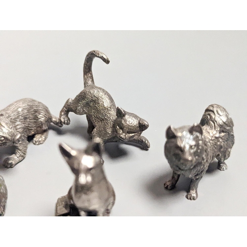 1840 - Four modern miniature freestanding model animals, including, badger, two dogs and a cat, JJSM, Londo... 