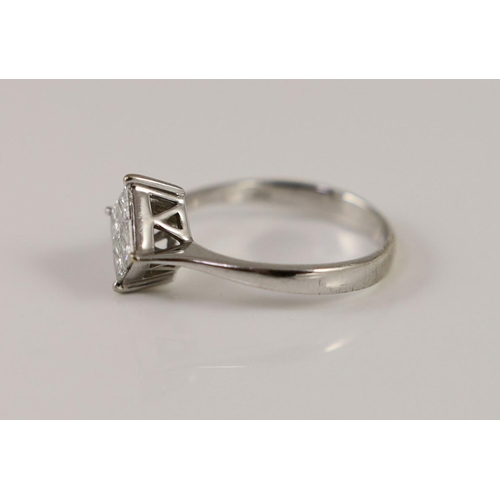 1875 - A modern 18k white gold and princess cut diamond set four stone cluster ring,size O, gross weight 3.... 