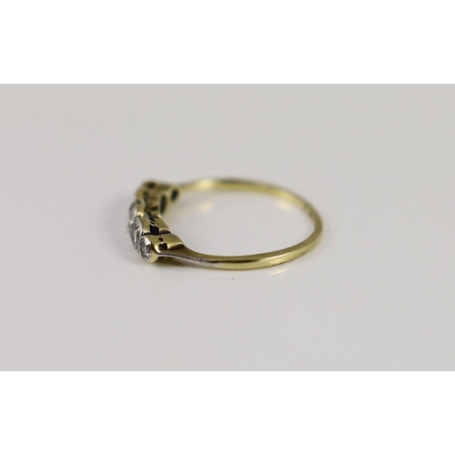 1876 - An early 20th century 18ct gold, platinum and graduated collet set five stone diamond ring,size N, g... 