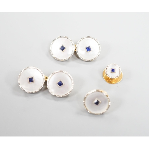 1878 - A pair of 18ct, mother of pearl and sapphire set circular cufflinks, 13mm and a pair of matching dre... 