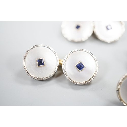 1878 - A pair of 18ct, mother of pearl and sapphire set circular cufflinks, 13mm and a pair of matching dre... 