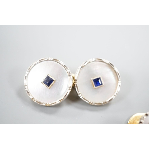 1878 - A pair of 18ct, mother of pearl and sapphire set circular cufflinks, 13mm and a pair of matching dre... 