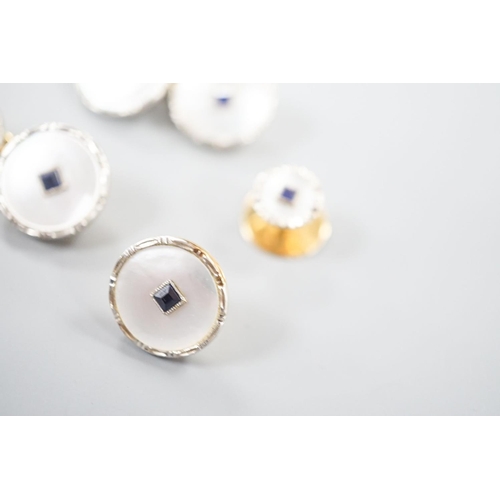 1878 - A pair of 18ct, mother of pearl and sapphire set circular cufflinks, 13mm and a pair of matching dre... 