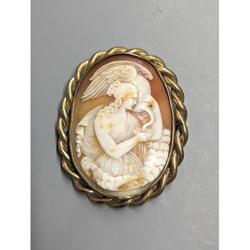 1954 - A late Victorian gilt metal mounted oval cameo shell brooch, carved with Leda & the Swan, 72mm.... 