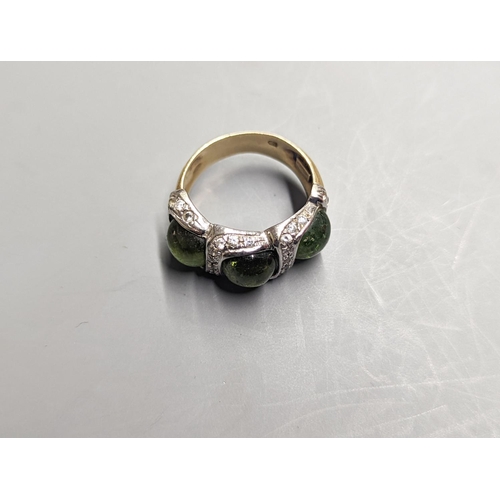 1956 - A modern 585 yellow metal, three stone green cabochon and diamond chip set dress ring, size N/O, gro... 