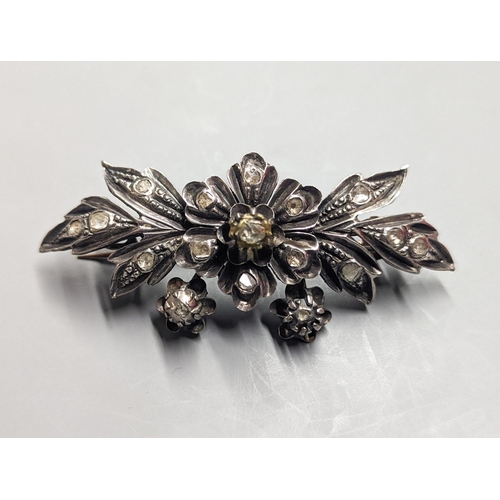 1957 - A 19th century continental white and yellow metal , rose cut diamond set floral spray brooch, 71mm, ... 