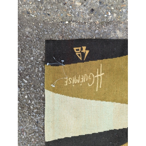 1077 - A modernist French tapestry, signed H. Gueyise, 240 x 106cm