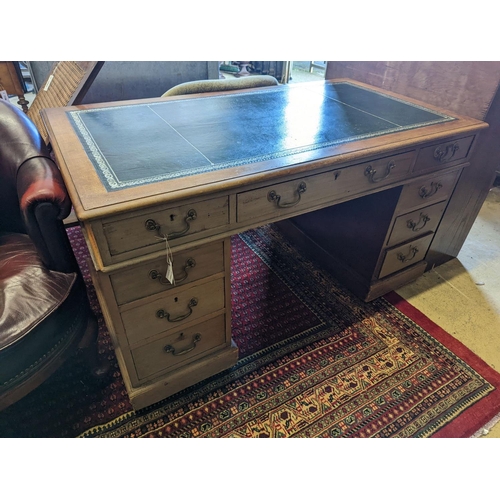 1079 - An Edwardian faded mahogany pedestal desk, stamped T. Willson, Great Queen Street, London, length 13... 