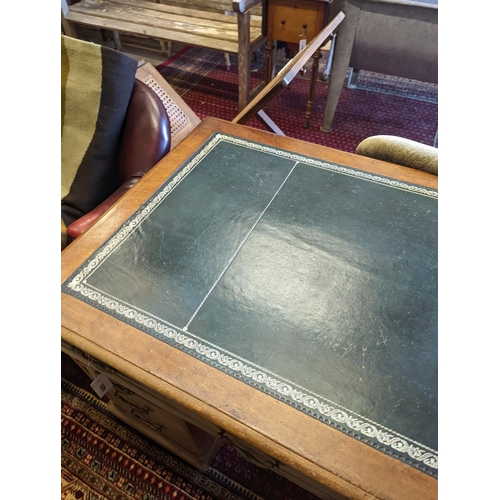 1079 - An Edwardian faded mahogany pedestal desk, stamped T. Willson, Great Queen Street, London, length 13... 