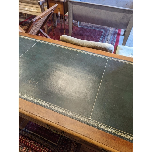 1079 - An Edwardian faded mahogany pedestal desk, stamped T. Willson, Great Queen Street, London, length 13... 