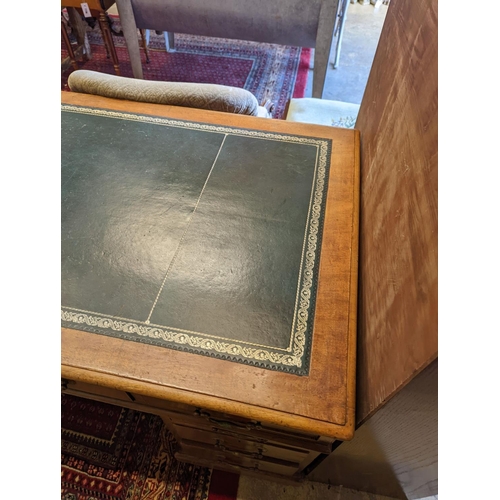 1079 - An Edwardian faded mahogany pedestal desk, stamped T. Willson, Great Queen Street, London, length 13... 