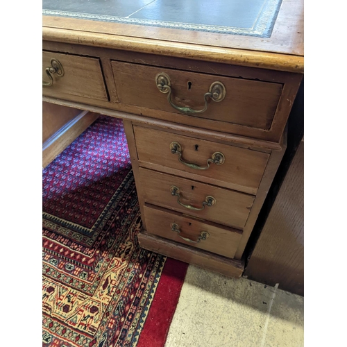 1079 - An Edwardian faded mahogany pedestal desk, stamped T. Willson, Great Queen Street, London, length 13... 