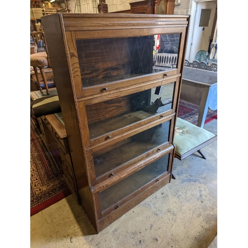 1080 - A Globe Wernicke style oak bookcase, (not sectional), width 88cm, depth 32cm, height 152cm... 