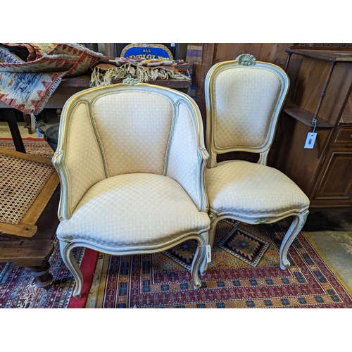 1085 - A Louis XVI style painted upholstered tub chair and a similar side chair