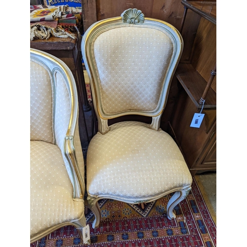 1085 - A Louis XVI style painted upholstered tub chair and a similar side chair