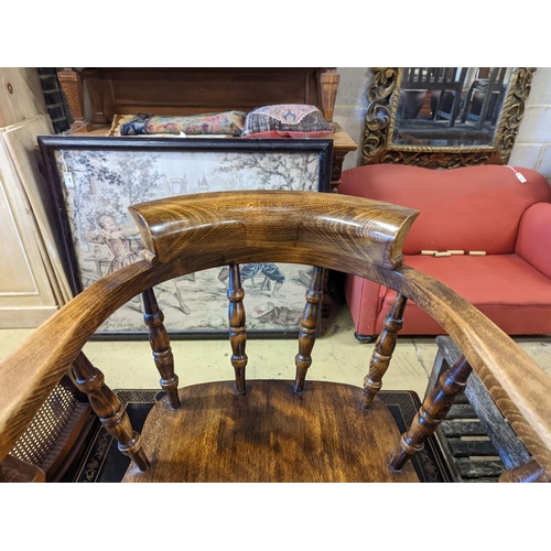 1088 - A Victorian style beech smoker's bow chair, width 63cm, depth 45cm, height 80cm