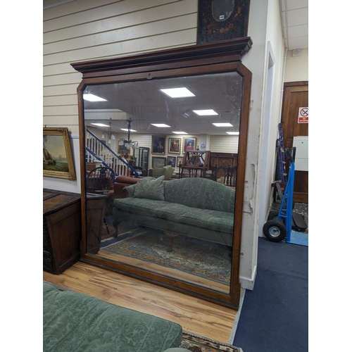 1095 - A large late Victorian aesthetic movement part ebonised oak overmantel mirror, width 162cm, height 1... 
