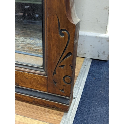 1095 - A large late Victorian aesthetic movement part ebonised oak overmantel mirror, width 162cm, height 1... 