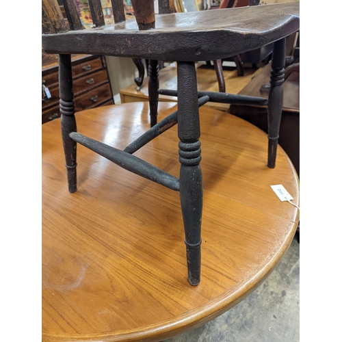 1111 - A Victorian elm and beech Windsor lathe back elbow chair, width 58cm, depth 47cm, height 109cm... 