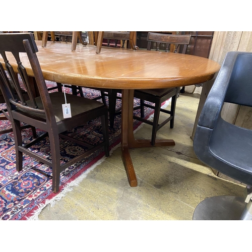 1112 - A mid century Danish teak circular extending dining table, two spare leaves, 220cm extended, width 1... 