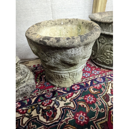 11 - A reconstituted stone garden plinth, height 79cm, together with two circular garden planters, larger... 