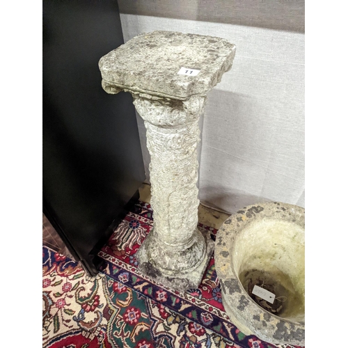 11 - A reconstituted stone garden plinth, height 79cm, together with two circular garden planters, larger... 