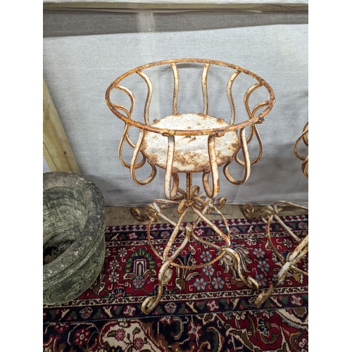 12 - A pair of painted wrought iron garden planters, diameter 40cm, height 74cm