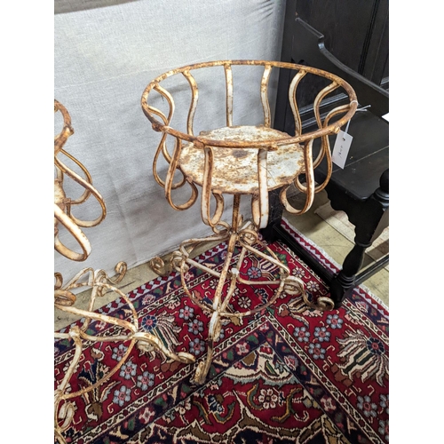 12 - A pair of painted wrought iron garden planters, diameter 40cm, height 74cm