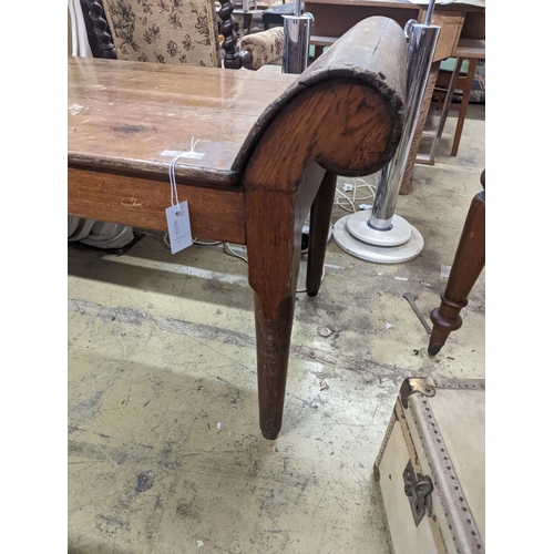 21 - An early 20th century oak examination table, length 180cm, depth 59cm, height 74cm