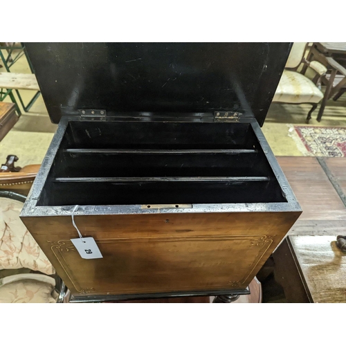 29 - A late Victorian inlaid walnut enclosed Canterbury, width 48cm, depth 31cm, height 68cm