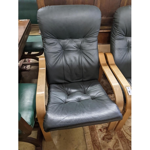 34 - A pair of mid century Norwegian green leather and bent ply armchairs, width 68cm, depth 80cm, height... 